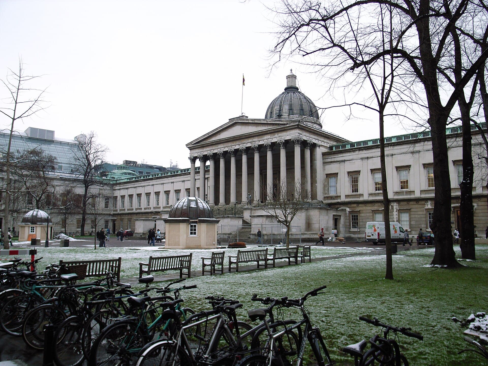 UCL's colonnaded Wilkins Building and dome, seen across the snow-covered front quad