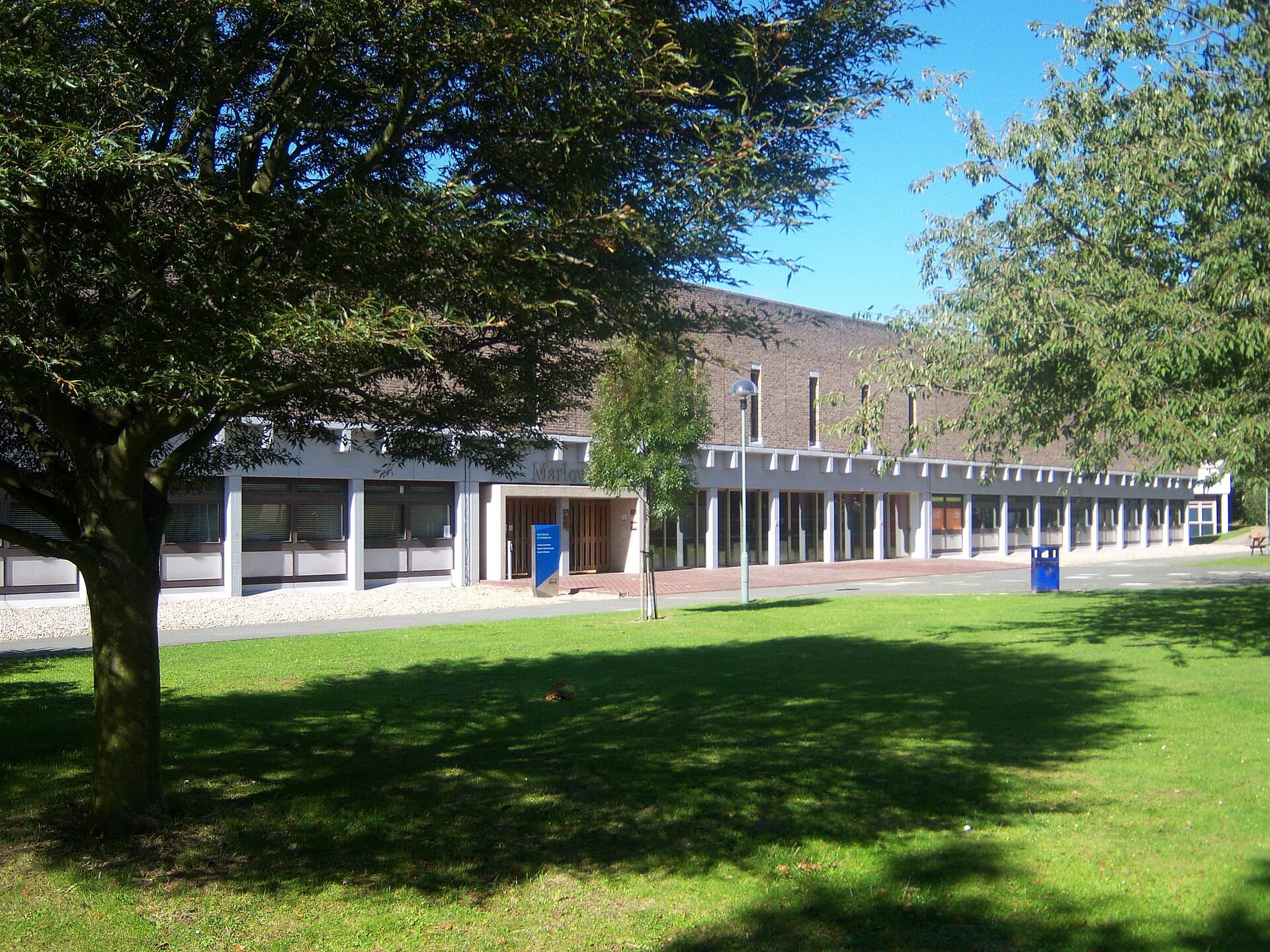 The Marlowe Building on the University of Kent's Canterbury campus, above the lawn in front of it