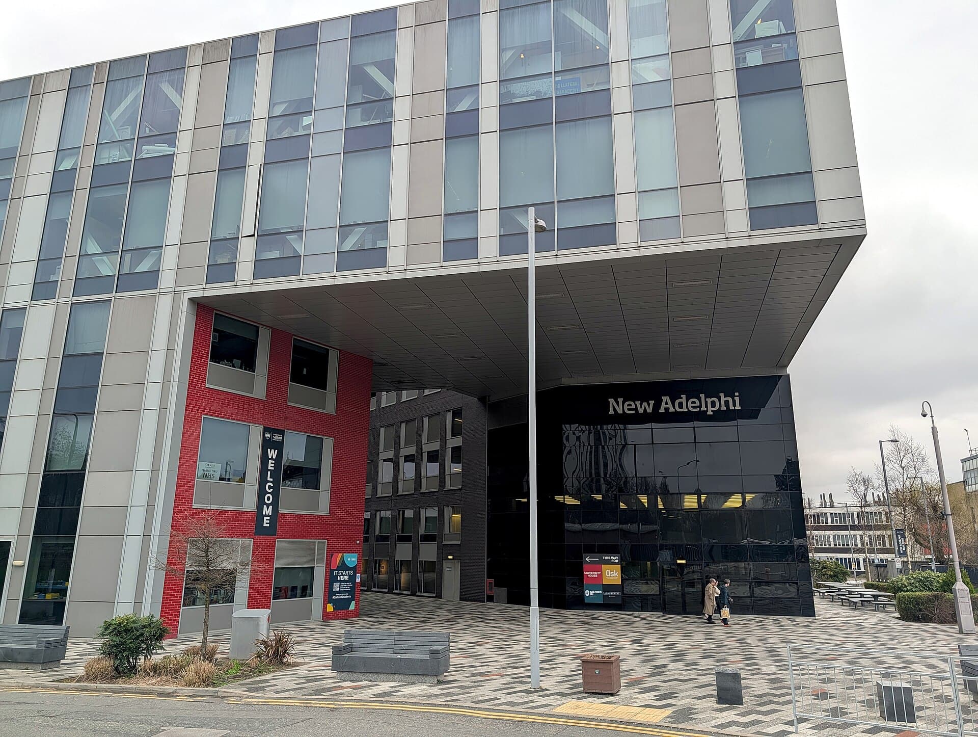 The glass frontage and red-brick entrance block of the University of Salford's New Adelphi building